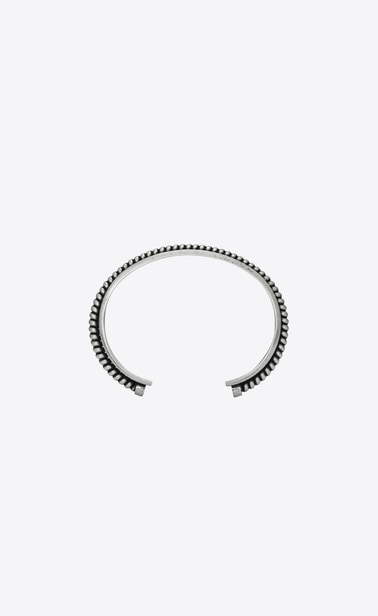 Folk cuff bracelet in metal with one twist